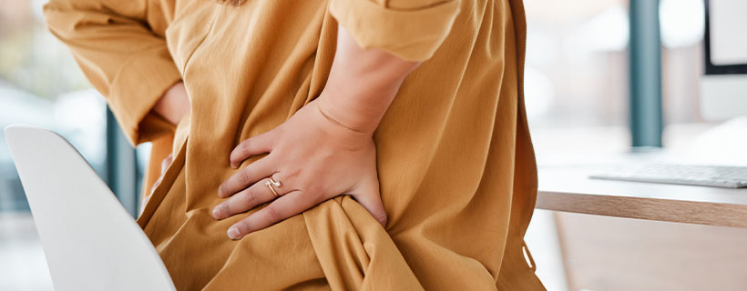 patient needing back pain chiropractor in Newport Beach CA