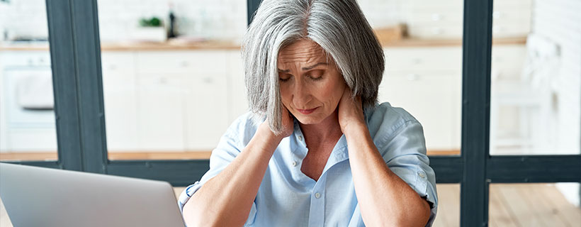 patient needing neck pain chiropractor in Newport Beach CA